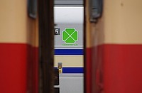 door, indoor, train, text