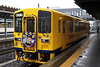 train, transport, outdoor, platform, track, yellow, station, land vehicle, vehicle, railroad, rail, pulling
